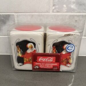 Santa coca-cola salt and pepper shakers. Gibson. New. Made in china.3 in. Porc